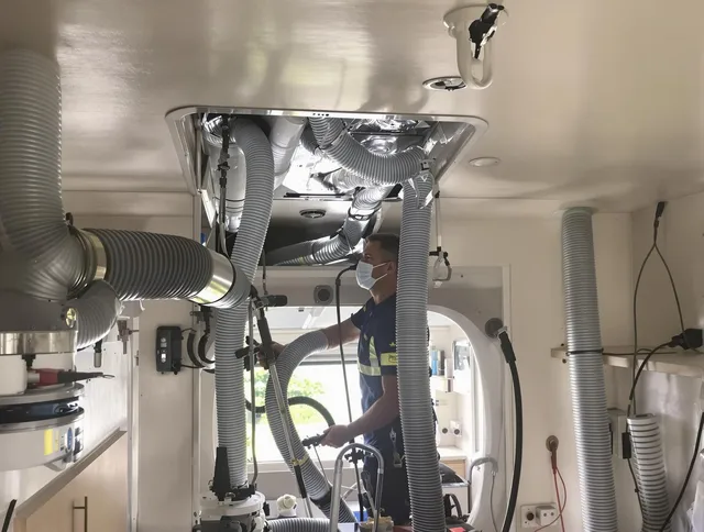 Glocester Air Duct Cleaning specialist performing precise mobile home duct cleaning in Glocester